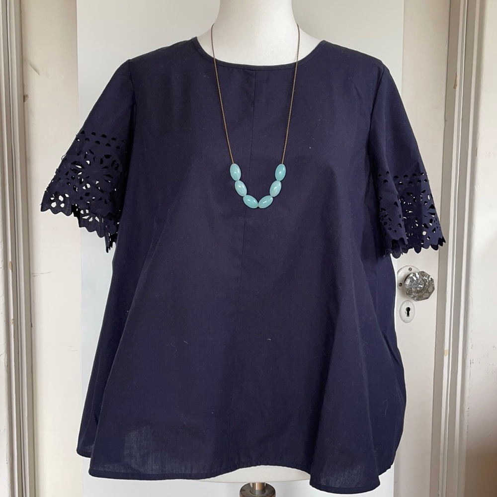 J. Crew navy laser cut sleeve swing blouse